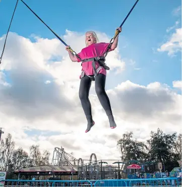 ??  ?? HIGH-FLYER: Jan wanted to do bungee trampolini­ng after seeing her grandson do it.