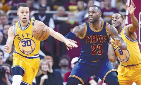  ?? (AP FOTO) ?? THE KING VS. THE ASSASSIN. The league’s two brightest stars Stephen Curry (left) and Lebron James will lock horns when Game 1 of the NBA finals open today.