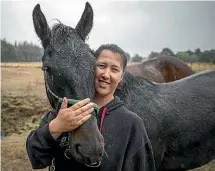  ?? MURRAY WILSON/ STUFF ?? Bulls woman Jade Bradley adopted 2-yearold Calypso, a Kaimanawa wild horse.