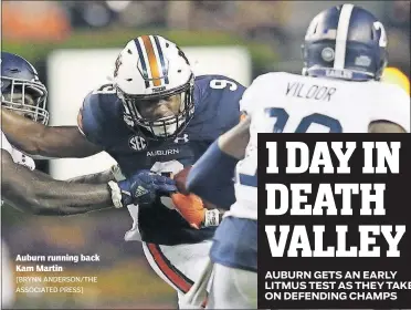  ?? [BRYNN ANDERSON/THE ASSOCIATED PRESS] ?? Auburn running back Kam Martin