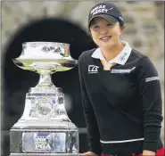  ?? MATT SLOCUM — THE ASSOCIATED PRESS ?? Sei Young Kim poses with the trophy after winning the Women’s PGA Championsh­ip Sunday by five strokes.