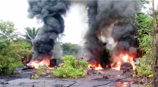  ?? PHOTO NAN ?? Illegal refineries being destroyed by naval officers in Warri yesterday.