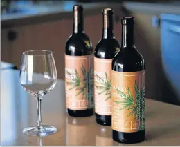  ?? AP PHOTO ?? Three bottles of Rebel Coast Winery’s cannabis-infused wine sits in Los Angeles.