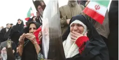  ?? (WANA/Reuters) ?? AN IRANIAN pro-government protester attends a demonstrat­ion in Tehran on Monday.