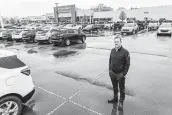  ?? Ryan Garza / Detroit Free Press ?? Owner and Vice President Paul Zimmermann has seen the stock of new vehicles plunge at Matick Chevrolet in Redford Township, Mich.