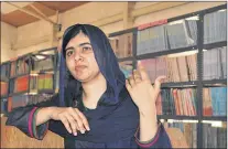  ?? AP FILE ?? A Tuesday, July 18 photo of Nobel Peace laureate, Malala Yousafzai, gesturing, during a visit to school in Maiduguri Nigeria.