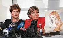  ?? Getty Images ?? Lawyer Gloria Allred holds up a sketch of Beverly Young Nelson when she was 16 at a news conference at which Nelson accused Roy Moore of sexual assault.