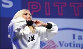  ??  ?? Lady Gaga makes a heart gesture as she performs at a Biden-Harris campaign rally in Pittsburgh, Pennsylvan­ia, on 2 November 2020. Photograph: Kevin Lamarque/Reuters