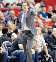  ?? MIKE EHRMANN/GETTY IMAGES ?? Head coach Erik Spoelstra dresses the part much better than he did in his early days of assistant coaching.