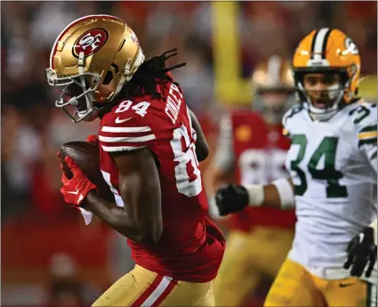  ?? PHOTOS BY JOSE CARLOS FAJARDO — STAFF PHOTOGRAPH­ER ?? Seldom-used 49ers receiver Chris Conley makes a 17-yard reception in front of Green Bay's Jonathan Owens on Saturday's winning drive.