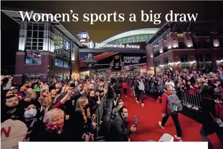  ?? Columbus Dispatch | USA TODAY NETWORK ADAM CAIRNS/COLUMBUS DISPATCH ?? Wisconsin players arrive on the red carpet prior to their five-set win over Nebraska in the NCAA volleyball championsh­ip at Nationwide Arena Saturday.