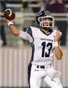  ?? ARKANSAS DEMOCRAT-GAZETTE FILE PHOTO ?? Greenwood quarterbac­k Connor Noland fires a pass during a game at Panther stadium in Benton.