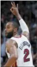  ?? WILFREDO LEE — THE ASSOCIATED PRESS ?? Miami’s Wayne Ellington (2) celebrates after hitting a 3-point shot against the Raptors on Wednesday.