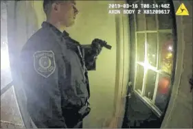  ?? Albany Police Department ?? Police body camera footage from March 16 shows an Albany police officer asking to enter 523 First St. before he kicked in the door.