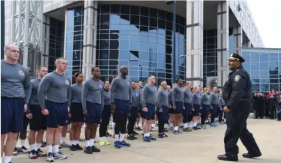  ?? STAFF FILE PHOTOS BY FAITH NINIVAGGI ?? THINNER BLUE LINE: Boston police Superinten­dent-in-Chief William Gross, above, and Commission­er William B. Evans, right, work with new Boston Police Department recruits earlier this year.