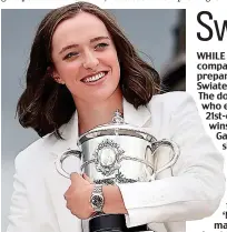  ?? GETTY IMAGES ?? No1: Swiatek with the trophy