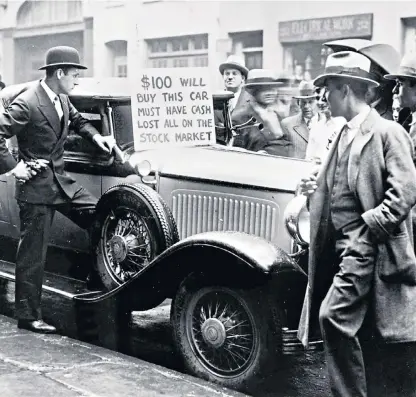 ??  ?? A victim of the 1929 Wall Street crash tries to regain some money. The Dow Jones fell by 25pc in four days, and by July 1932 was down almost 90pc