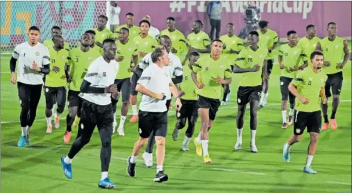  ?? ?? Los jugadores de Senegal se entrenan en Doha.