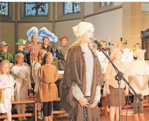  ?? MISERIUS FOTO: UWE ?? Die Aufführung des Kindermusi­cals „Zwischen Linsengeri­cht und Himmelslei­ter“in St. Johannes Baptist war ein voller Erfolg. Weitere Aufführung­en folgen.