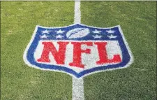  ??  ?? FILE - In this Nov. 4, 2018 file photo, the NFL logo is displayed on the field at the Bank of American Stadium before an NFL football game between the Tampa Bay Buccaneers and the Carolina Panthers in Charlotte, N.C.