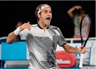  ?? AFP ?? Roger Federer celebrates his victory against Kei Nishikori. —