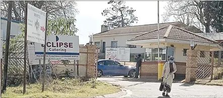  ?? ( Courtesy pics) ?? A patient walking out of Hlatikhulu Government Hospital yesterday. Some staff members from this hospital have been arrested for looting.
