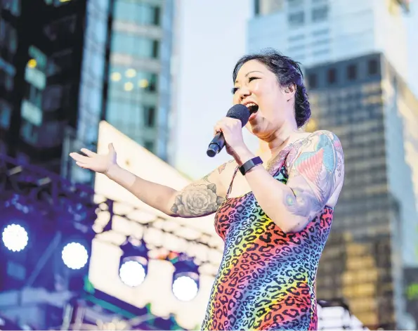  ?? Roy Rochlin / Getty Images ?? Comedian Margaret Cho hosts the Closing Ceremony ofWorldPri­de NYC 2019 at Times Square in June. She heads to The Ridgefield Playhouse with her latest show.