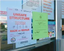  ?? RICK KINTZEL/THE MORNING CALL ?? Unsafe structure signs are posted on the entrance door to Happy Smiles Learning Center in the 400 block of Wabash Street in Allentown after a carbon monoxide leak sickened children and adults there on Oct. 11.