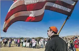  ?? Irfan Khan Los Angeles Times ?? SCOTT CUTLER attends a rally Saturday in Joshua Tree to protest the partial government shutdown and its effects on the park and local community.