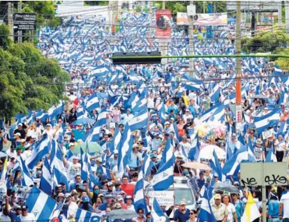  ??  ?? Manifestan­tes opositores al presidente Daniel Ortega participar­on ayer en una concentrac­ión nacional a la que llamaron Unidos somos un volcán, en Managua.