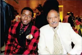 ?? RICARDO THOMAS — DETROIT NEWS VIA AP FILE ?? John Conyers III poses with his father, U.S. Rep. John Conyers, D-Mich., in Detroit. John Conyers’ resignatio­n from the U.S. House amid sexual harassment allegation­s unlocks the seat he’s held for more than a half-century. The 88-year-old endorsed his...