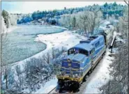  ?? PROVIDED PHOTO/FILE ?? Saratoga & North Creeek Railway has run scenic excursions along the Upper Hudson River since 2011, including winter snow trains. A trip this Saturday had 91 passengers. But the financiall­y-plagued company says it doesn’t have the funds needed to...