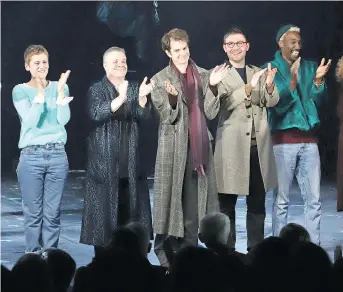  ?? THE ASSOCIATED PRESS ?? Denise Gough, left, Nathan Lane, Andrew Garfield, James McArdle and Nathan Stewart-Jarrett star in the Broadway revival of Angels in America. Garfield applauds the play’s life-affirming optimism.