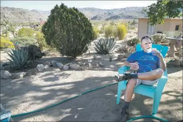  ?? Photograph­s by Gina Ferazzi Los Angeles Times ?? LONGTIME Joshua Tree resident Mark Grden says some tourists “seem to think anything goes out here.”