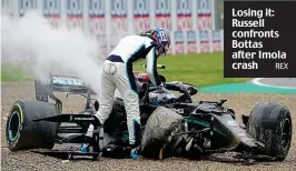  ?? REX ?? Losing it: Russell confronts Bottas after Imola crash