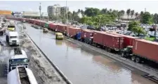  ??  ?? Water-logged road leading into Apapa Port