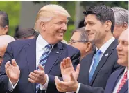  ?? EVAN VUCCI/ASSOCIATED PRESS ?? President Donald Trump talks with House Speaker Paul Ryan in the Rose Garden of the White House in Washington, Thursday, after the House passed the health bill.