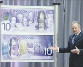  ?? CP PHOTO ?? Governor of the Bank of Canada Stephen Poloz speaks after unveiling of the Canada 150 commemorat­ive bank note in Ottawa.