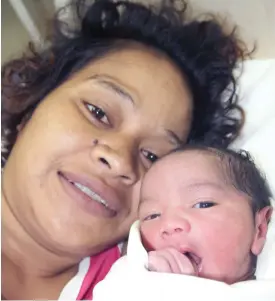  ?? Photo: Ronald Kumar ?? Iva Leo, 33, with her Christmas Baby (not yet named) at Colonial War Memorial Hospital in Suva yesterday.