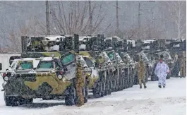  ?? — AFP ?? Armoured personnel carrier (APC) of the 92nd separate mechanised brigade of Ukrainian Armed Forces move to park in their base near Klugino-Bashkirivk­a village, in the Kharkiv region on Monday.