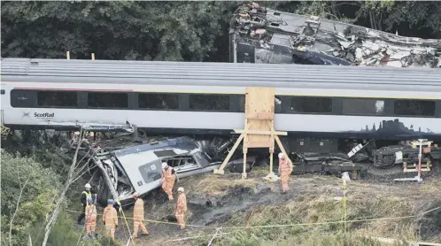  ?? PICTURE: JOHN DEVLIN ?? 0 A new access road being built to remove the wrecked carriages is at a ‘very advanced stage’