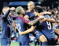  ??  ?? SUBLIME Cavani celebrates second with Alves and Mbappe