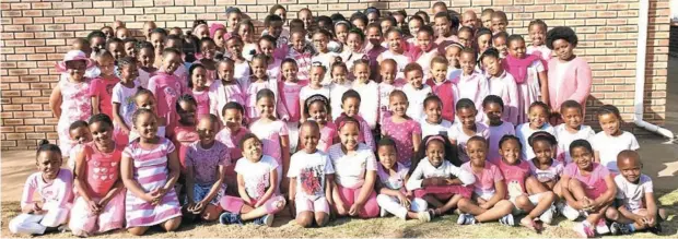  ?? Picture: SUPPLIED ?? IN THE PINK: Pupils at Stepping Stone Junior School recently showed their support for Breast Cancer Month by wearing pink and white to school