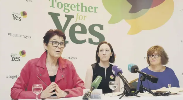  ?? PICTURE: NIALL CARSON/PA ?? 0 Together for Yes leaders Ailbe Smyth, Grainne Griffin and Orla O’connor hold their final press conference in Dublin after their successful campaign