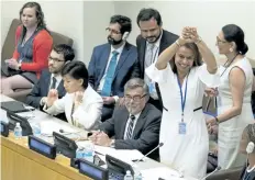  ?? MARY ALTAFFER/THE ASSOCIATED PRESS ?? Costa Rican Ambassador Elayne Whyte Gomez, president of the UN Conference to Negotiate a Legally Binding Instrument to Prohibit Nuclear Weapons, reacts after a vote to adopt a legally binding ban of nuclear weapons.