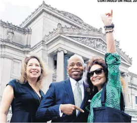  ??  ?? Diane Von Furstenber­g, at right, is shown with Borough President Eric Adams, center, declaring June 4 “CFDA Day” in Brooklyn.