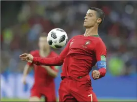  ??  ?? Portugal’s Cristiano Ronaldo controls the ball during the group B match between Portugal and Spain at the 2018 soccer World Cup in the Fisht Stadium in Sochi, Russia, on Friday. AP PHOTO/ SERGEI GRITS
