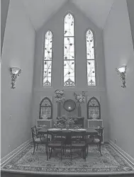  ?? ?? The dining room features the raised altar and vaulted ceilings from the church.