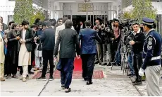  ?? — AFP photo ?? Newly-elected lawmakers arrive before the start of the electoral process to appoint Pakistan’s next prime minister at the Parliament House in Islamabad.