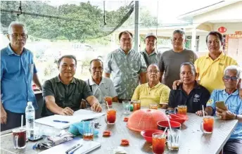  ??  ?? Brian (seated left), Lembat (standing fourth right) and members of the newly formed club.